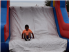 Boy on Inflatable Slide
