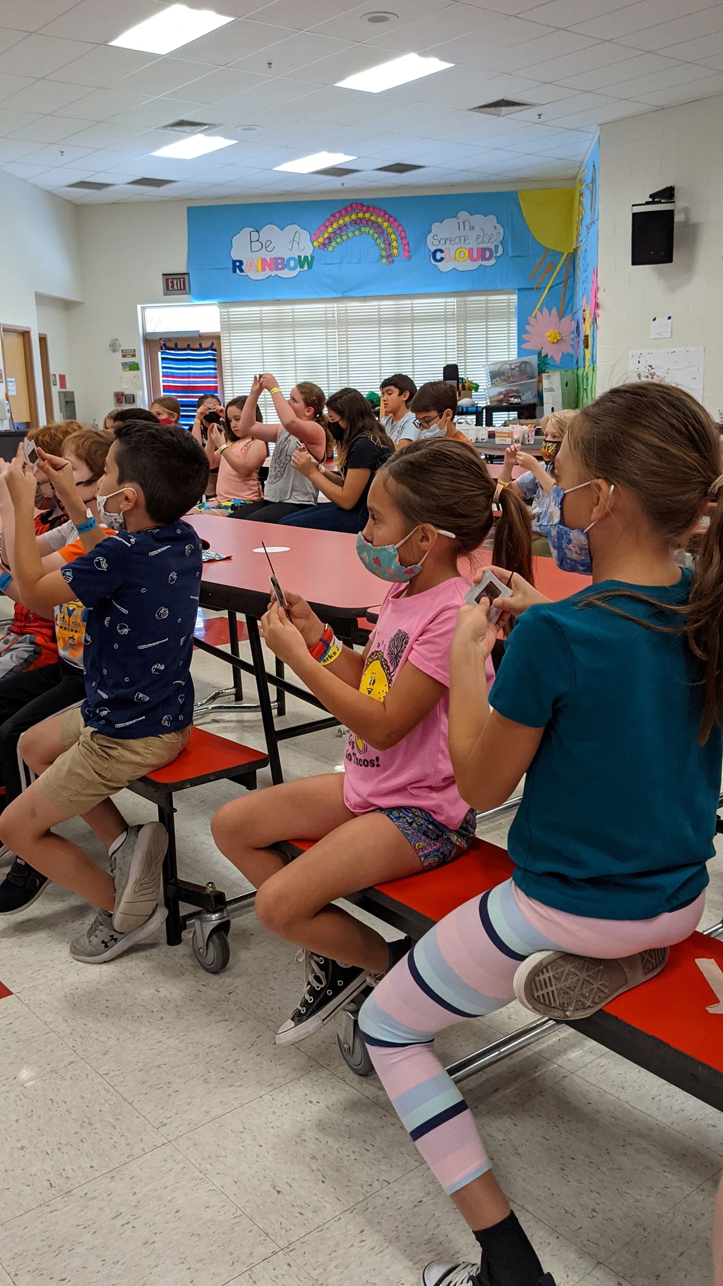 Kids Looking at Polar Lens