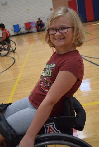Child Posing in Wheelchair