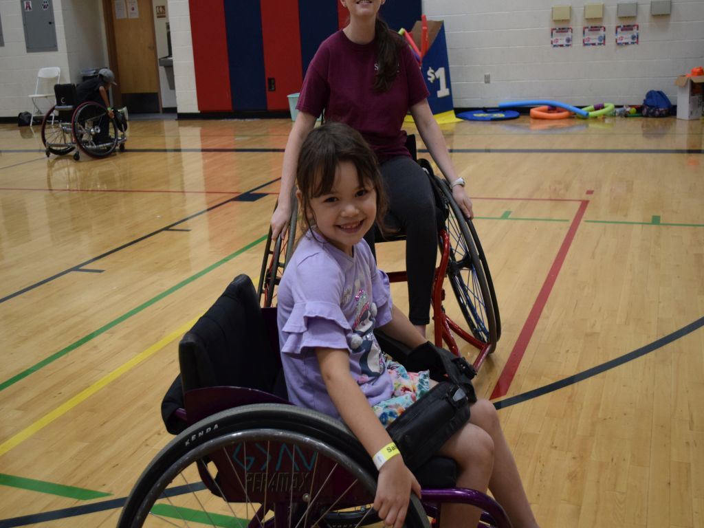 Young Girl Posing in Wheelchair